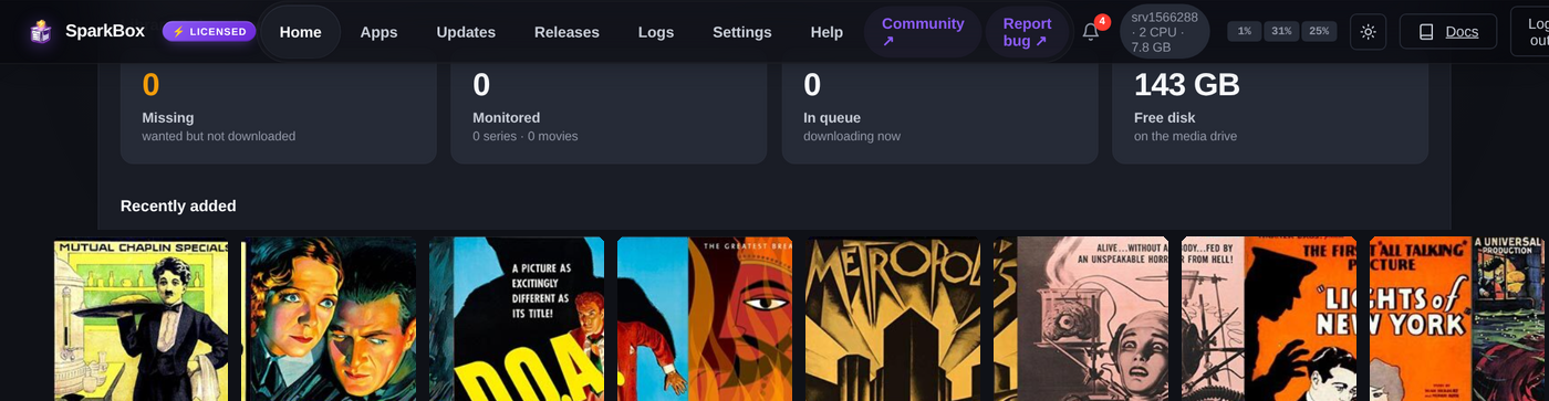 The SparkBox media command center — a Recently Added row of public-domain classic movie posters above Library & download stats (missing, monitored, in queue, free disk)